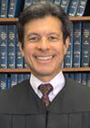 Hon. Dennis Landin